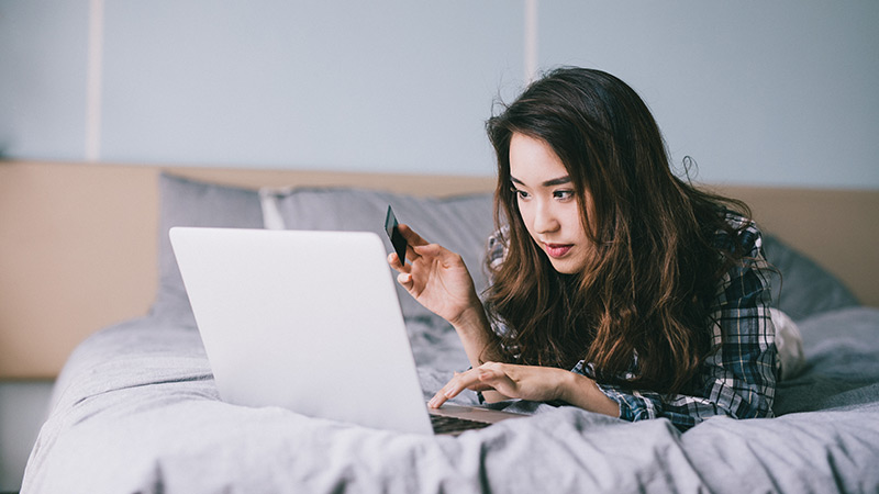 Woman looking at her laptop